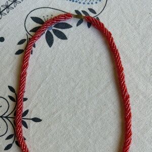 Twisted 6-strand raspberry beaded necklace